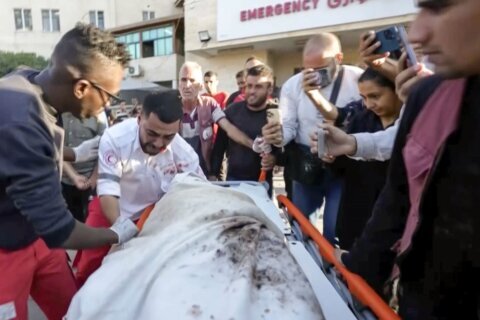 A Gaza medic realizes he’s carrying his own mother’s body, killed by an Israeli airstrike