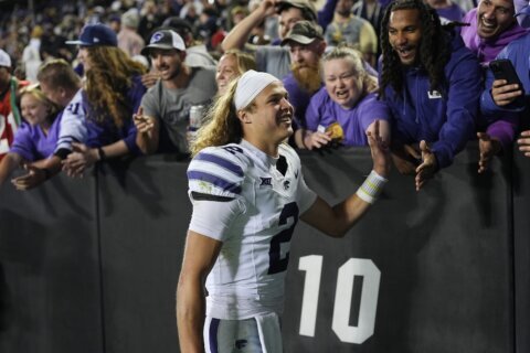 Johnson shrugs off late interception, throws winning TD as No. 18 Kansas St beats Colorado 31-28