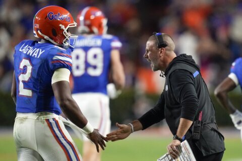 Florida says coach Billy Napier will return for a fourth season despite 15-18 record