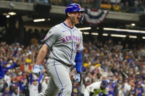 Mets advance in playoffs with 4-2 win over Brewers as Alonso homers to spark 9th-inning rally