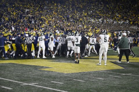 Michigan and Michigan State throw punches, push and shove after Wolverines beat rival Spartans