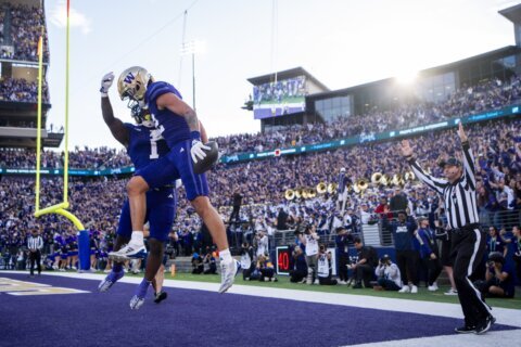 Washington pulls away in 4th quarter to beat No. 10 Michigan 27-17 in title game rematch