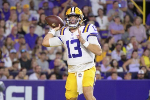 Nussmeier throws late TD passes, No. 13 LSU rallies to beat No. 9 Ole Miss 29-26 in overtime