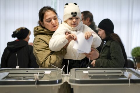 Moldovan president appears set to win 1st round of presidential race, but EU vote could be rejected