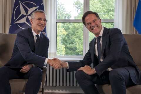 NATO’s long-time chief hands over to a former Dutch premier