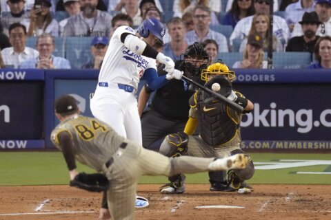 Ohtani homers in playoff debut and the Dodgers rally to beat the Padres 7-5 in NLDS opener