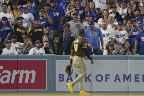 Dodger Stadium fans toss balls and trash on field, interrupt Padres’ 10-2 win that evens NLDS