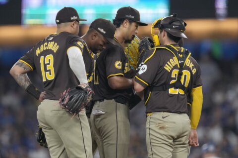 Tossed balls from stands, apparently aimed at Profar, cause 12-minute delay at NLDS Game 2