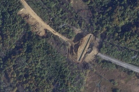 Satellite images show North Korea dug large border trenches after demolishing road, rail links