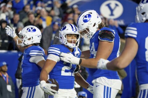 No. 13 BYU outlasts Oklahoma State to remain undefeated, winning 38-35 on TD with 10 seconds left