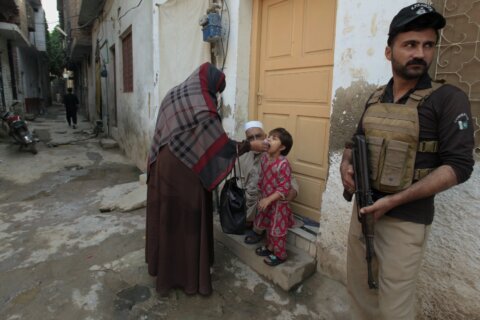 Attack on a health center used in an anti-polio campaign in Pakistan kills 2 police officers