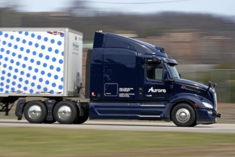 Autonomous truck company Aurora delays hauling freight without human drivers until April