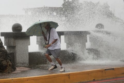 2 dead and thousands evacuated as a typhoon approaches Taiwan