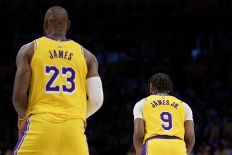 Bronny James scores first NBA points as LeBron watches his son from Lakers’ bench in loss to Cavs