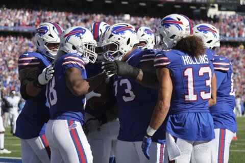 Cooper scores in his Bills debut and Allen shakes off a sluggish start in 34-10 rout of Titans