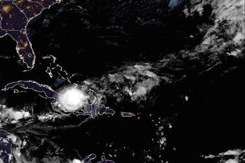 Tropical Storm Oscar heads toward the Bahamas after dumping rains on eastern Cuba