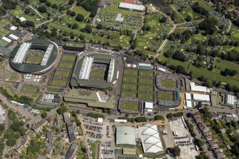 Wimbledon tennis tournament replaces line judges with AI technology in break with tradition