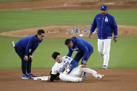 Shohei Ohtani partially dislocates left shoulder during World Series Game 2, status TBD