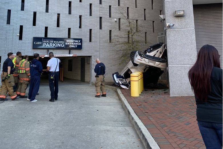 The vehicle fell around 40 feet from a parking garage at the Barlow Building on Wisconsin Avenue near South Park Avenue, according to Montgomery County Fire and EMS spokesman Pete Piringer.