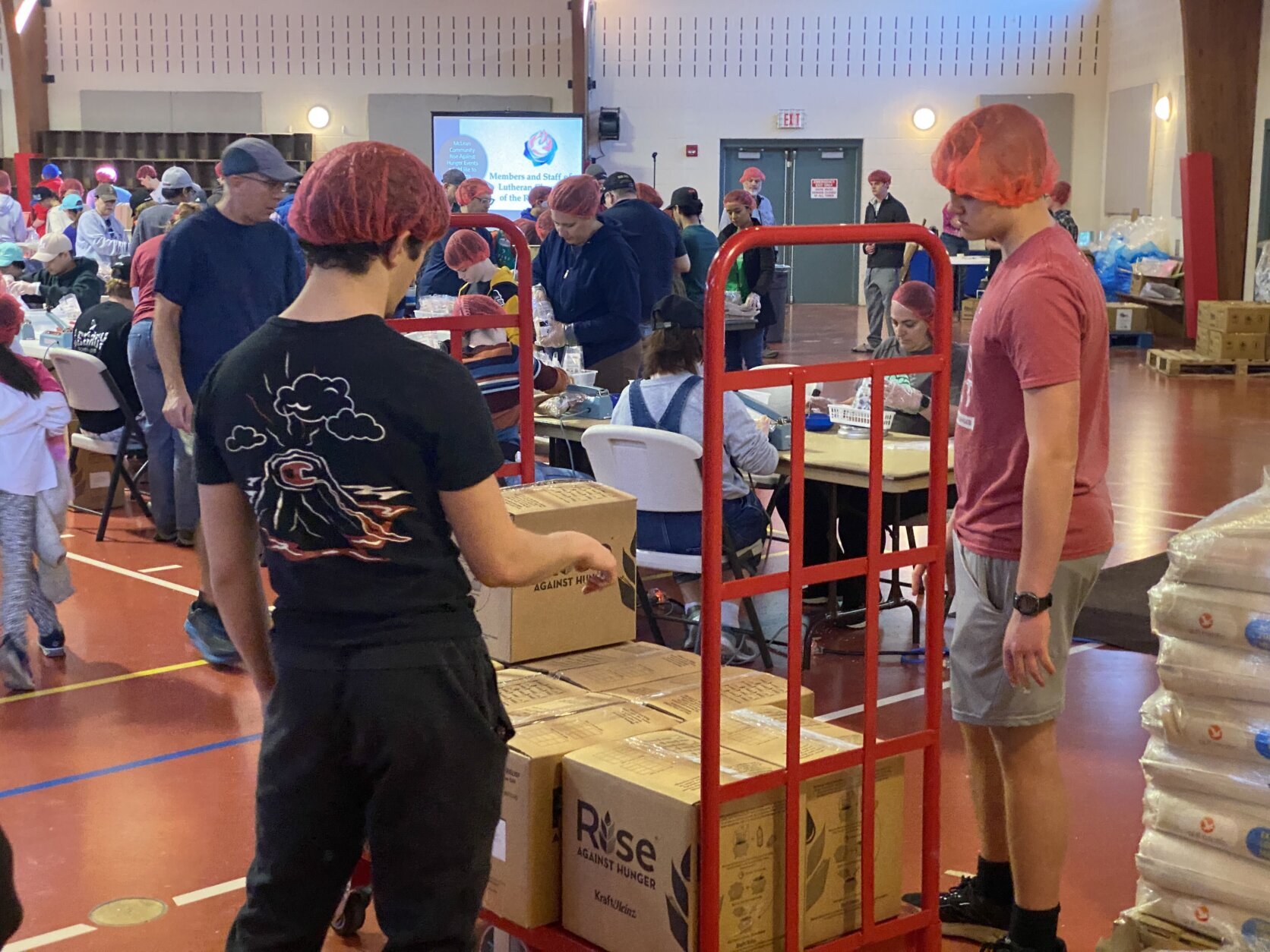 Volunteers packing boxes