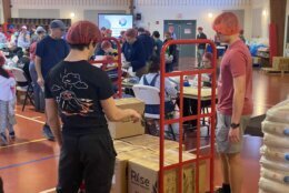 Volunteers packing boxes