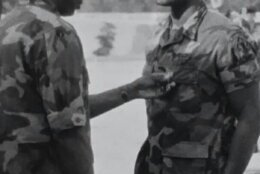 Command Sergent Major Younger pinning The Meritorious Service Medal on his son PFC Collin L Younger Jr.