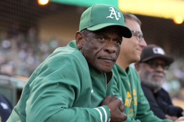 Former Oakland Athletics player Rickey Henderson before a baseball game between the Athletics and the Texas Rangers in Oakland, Calif., Wednesday, Sept. 25, 2024. (AP Photo/Jeff Chiu)