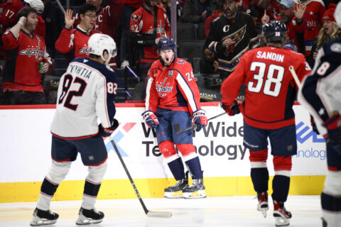 McMichael, Ovechkin power surging Capitals past Blue Jackets 7-2