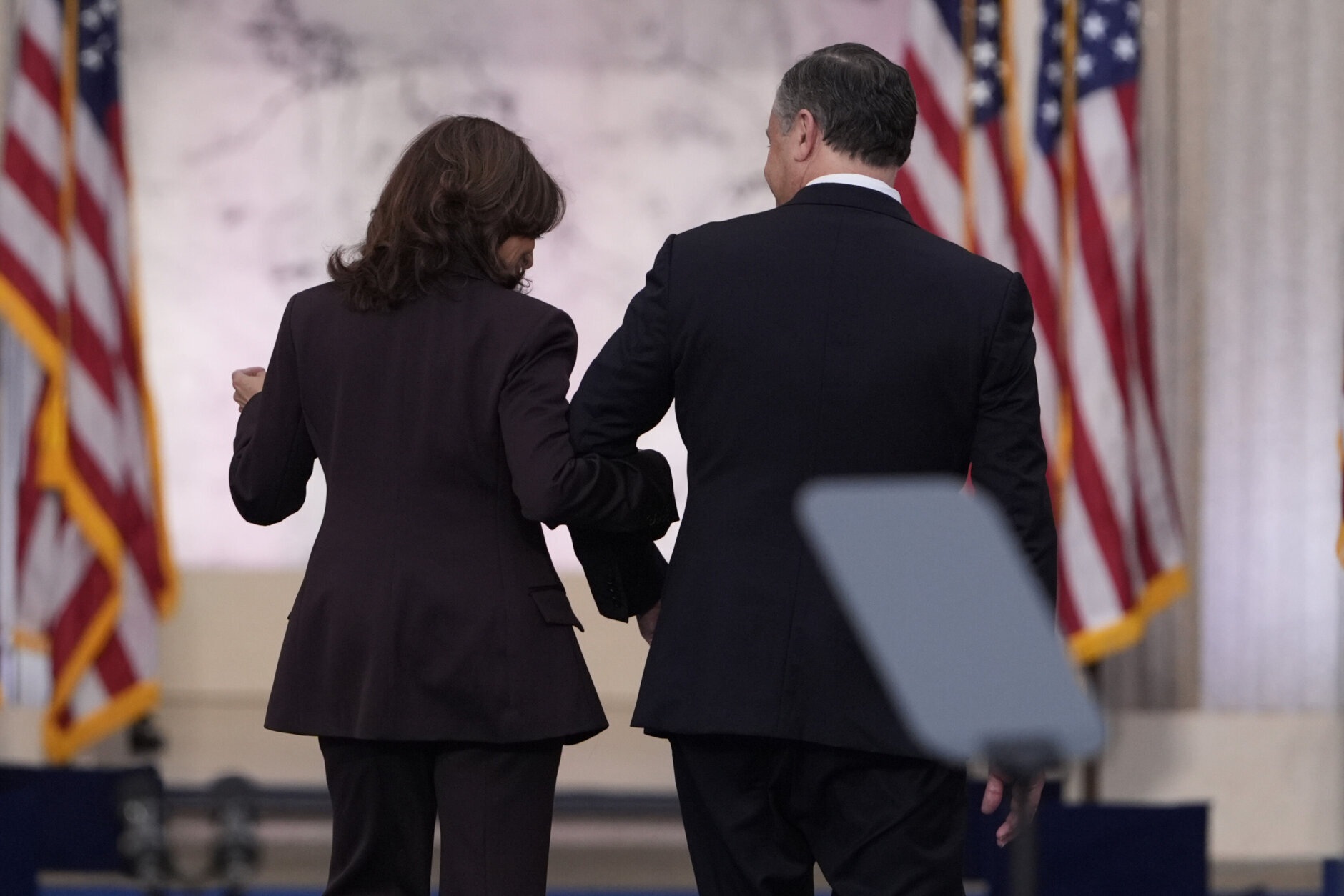 Vice President Kamala Harris, left, takes the arm of second gentleman Doug Emhoff as she departs after delivering a concession speech for the 2024 presidential election on the campus of Howard University in Washington, Wednesday, Nov. 6, 2024. (AP Photo/J. Scott Applewhite)