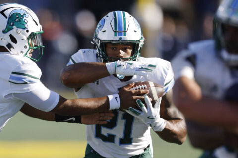 No. 25 Tulane routs Navy 35-0 to clinch a spot in the AAC championship game