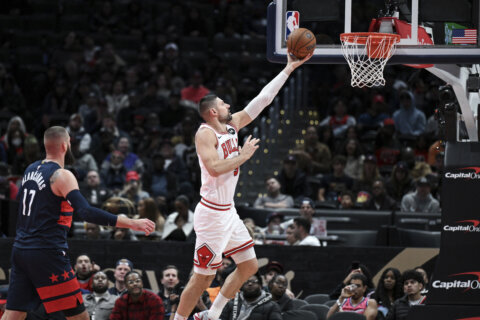 Vucevic and White lead Bulls to 127-108 win over Wizards, losers of 12 straight