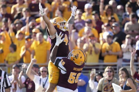 After fans storm field early, No. 21 Arizona St stops Hail Mary try for 28-23 win over No. 14 BYU