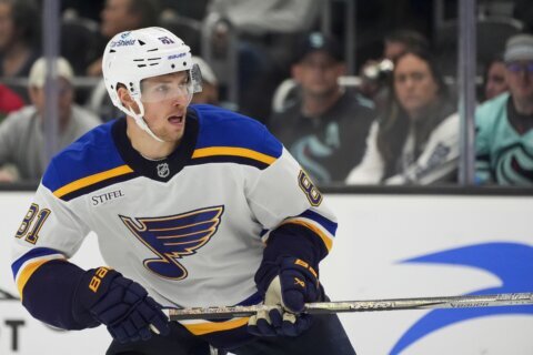 Blues’ Dylan Holloway escapes serious injury after being struck in neck by puck