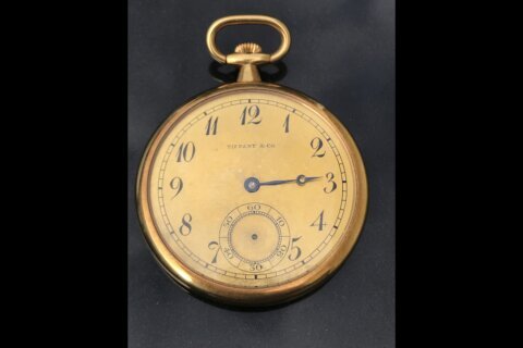 A gold pocket watch given to the captain who rescued Titanic survivors sells for record price