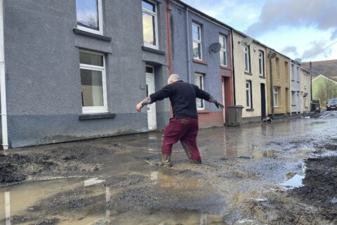 Hundreds of homeowners in England and Wales battle floodwaters after weekend storm