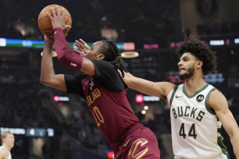 Darius Garland scores 39, Cavs improve to 8-0 with 116-114 win over struggling Bucks without Giannis