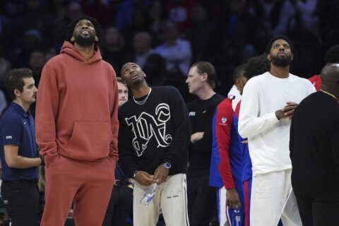 Injured Joel Embiid, Paul George watch from the 76ers’ bench once again