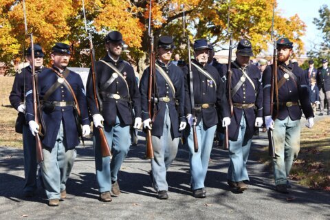 Remains of nearly 30 Civil War veterans found in a funeral home’s storage are laid to rest