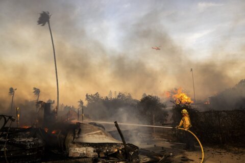 Slower winds aid firefighters battling destructive blaze in California