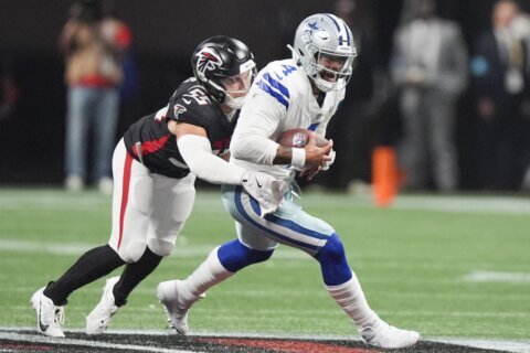 Cowboys QB Dak Prescott is knocked out of game at Atlanta with hamstring injury