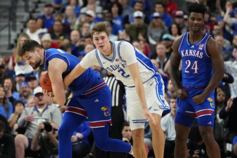 Kansas center Hunter Dickinson ejected for kicking Duke’s Maliq Brown in the head