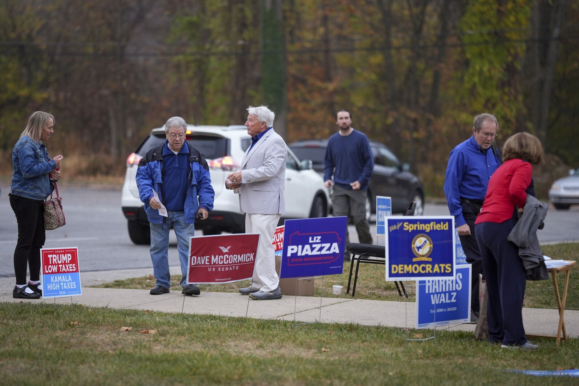 The Latest Trump and Harris cede stage to voters who’ll also decide