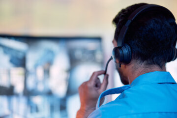 Man working inside the D.C. Office of Unified Communications center