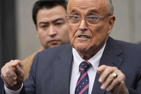 Rudy Giuliani draws rebuke for a courtroom outburst accusing judge in assets case of being unfair