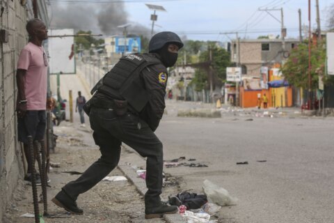 Haiti’s main airport and capital frozen a day after a plane was shot by gangs