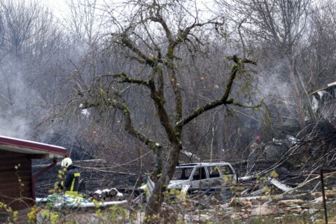 DHL cargo plane crashes into a house in Lithuania, killing at least 1