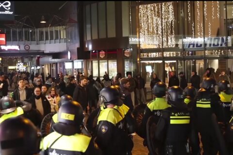 Amsterdam police say 5 hospitalized and 62 detained after attacks on Israeli soccer fans