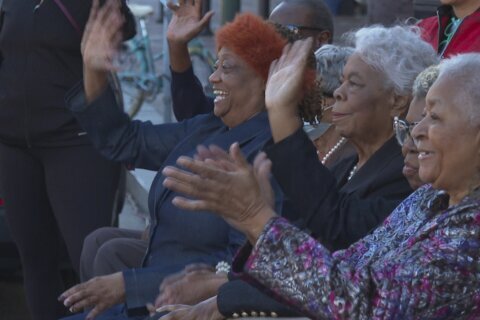 New Orleans marks with parade the 64th anniversary of 4 little girls integrating city schools