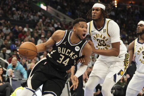 Antetokounmpo gets triple-double as surging Bucks beat slumping Pacers 129-117 in NBA Cup play