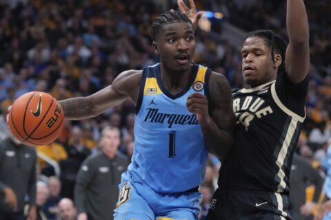 Kam Jones gets triple-double as No. 15 Marquette trounces No. 6 Purdue 76-58